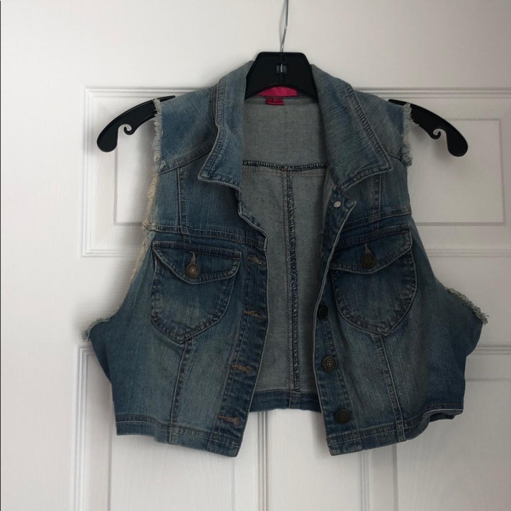 Sleeveless denim crop vest.
